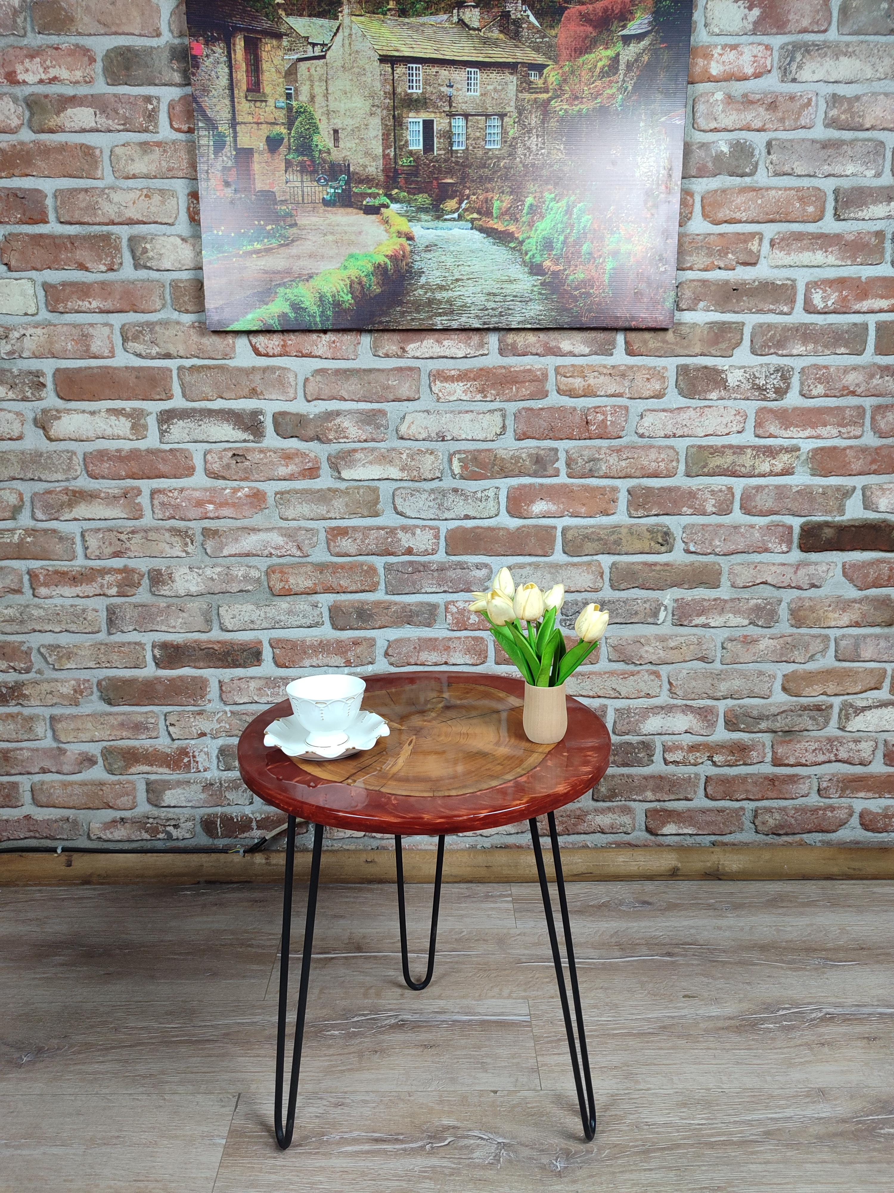 Walnut Accent Table with Black Metal Legs and Red epoxy decorations.