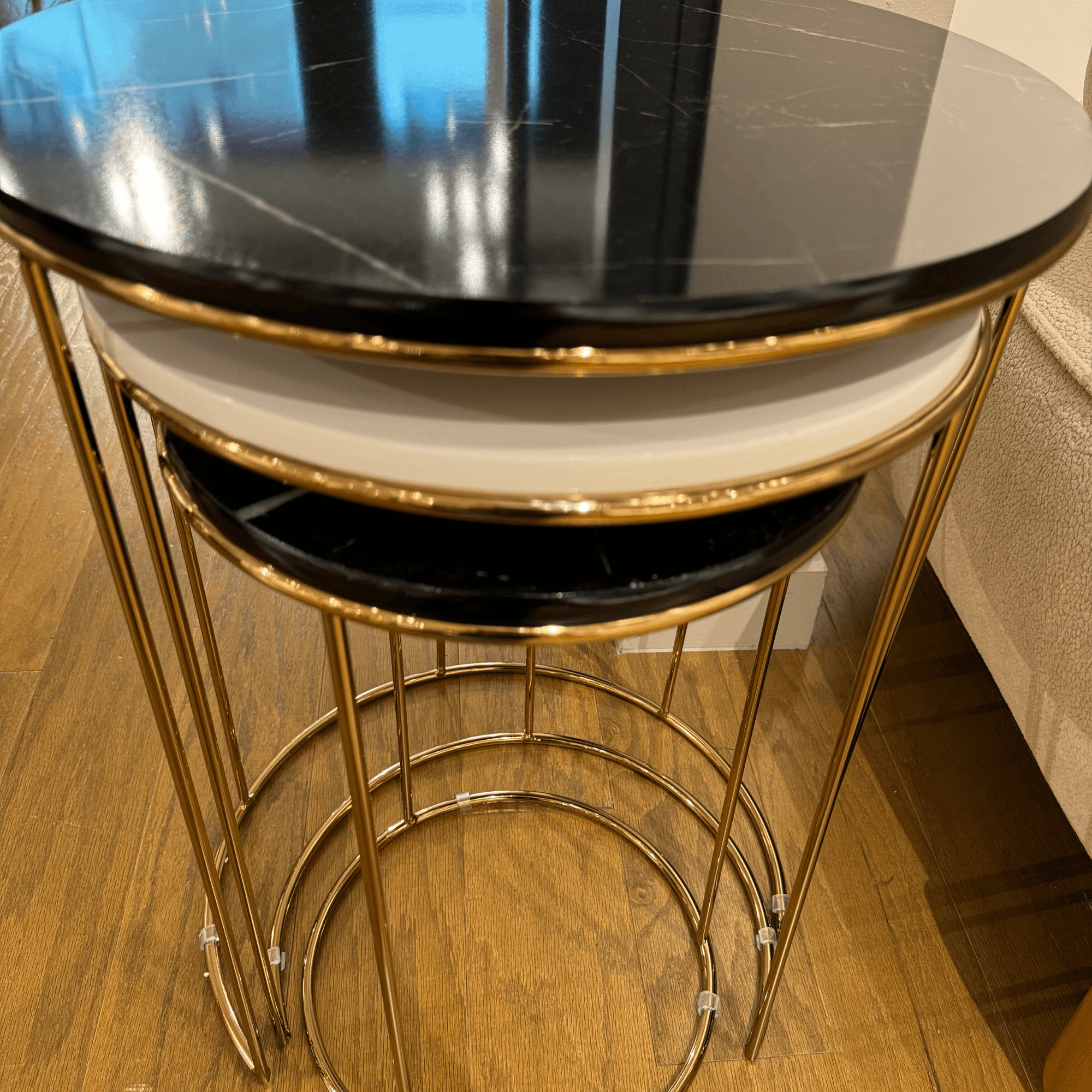 Ferozzi Modern Round Nesting Table Set with Black Marble-Style Tops and Gold Metal Frames