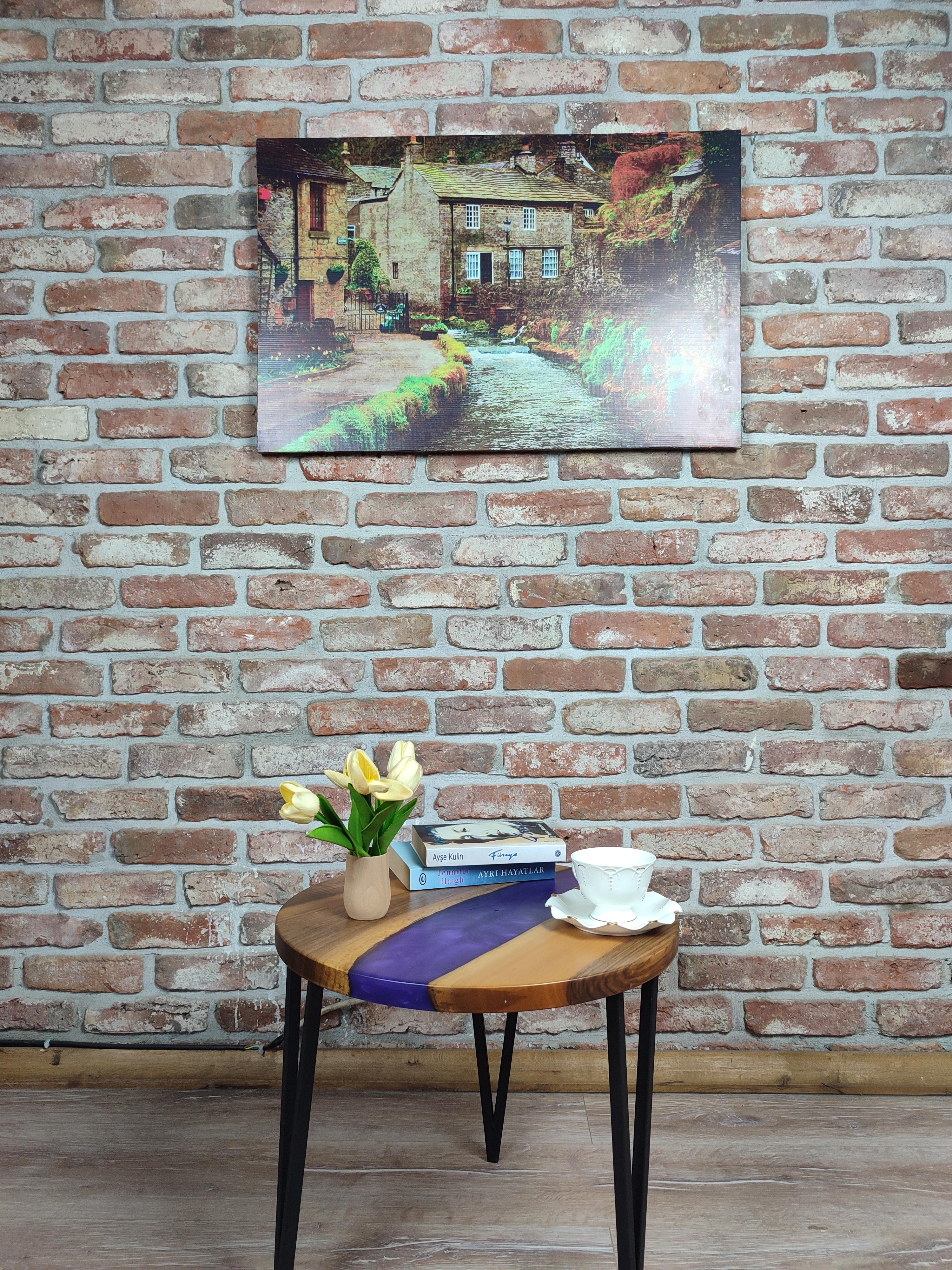 Walnut Accent Table with black metal legs and purple epoxy decorations.