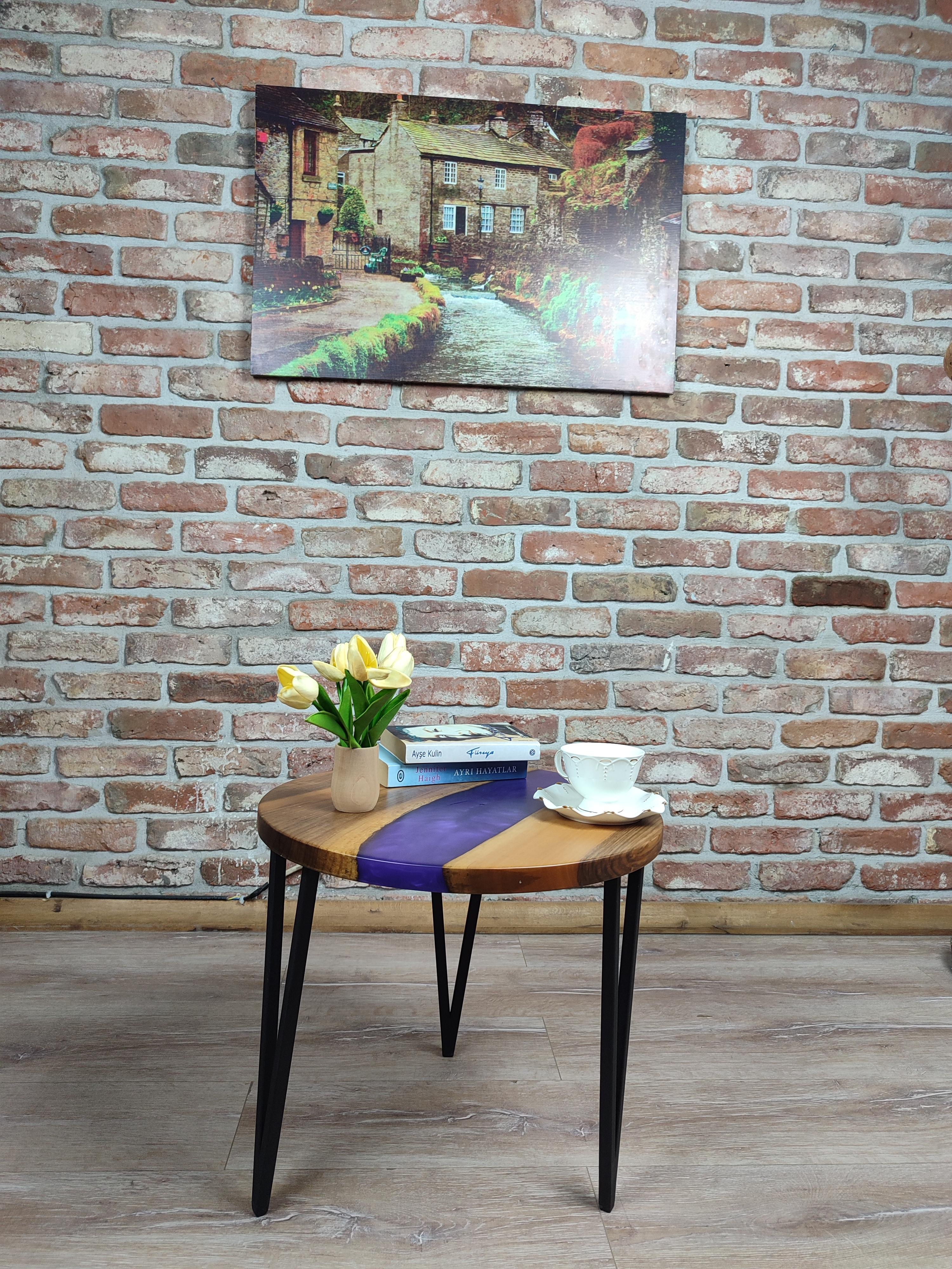 Walnut Accent Table with black metal legs and purple epoxy decorations.