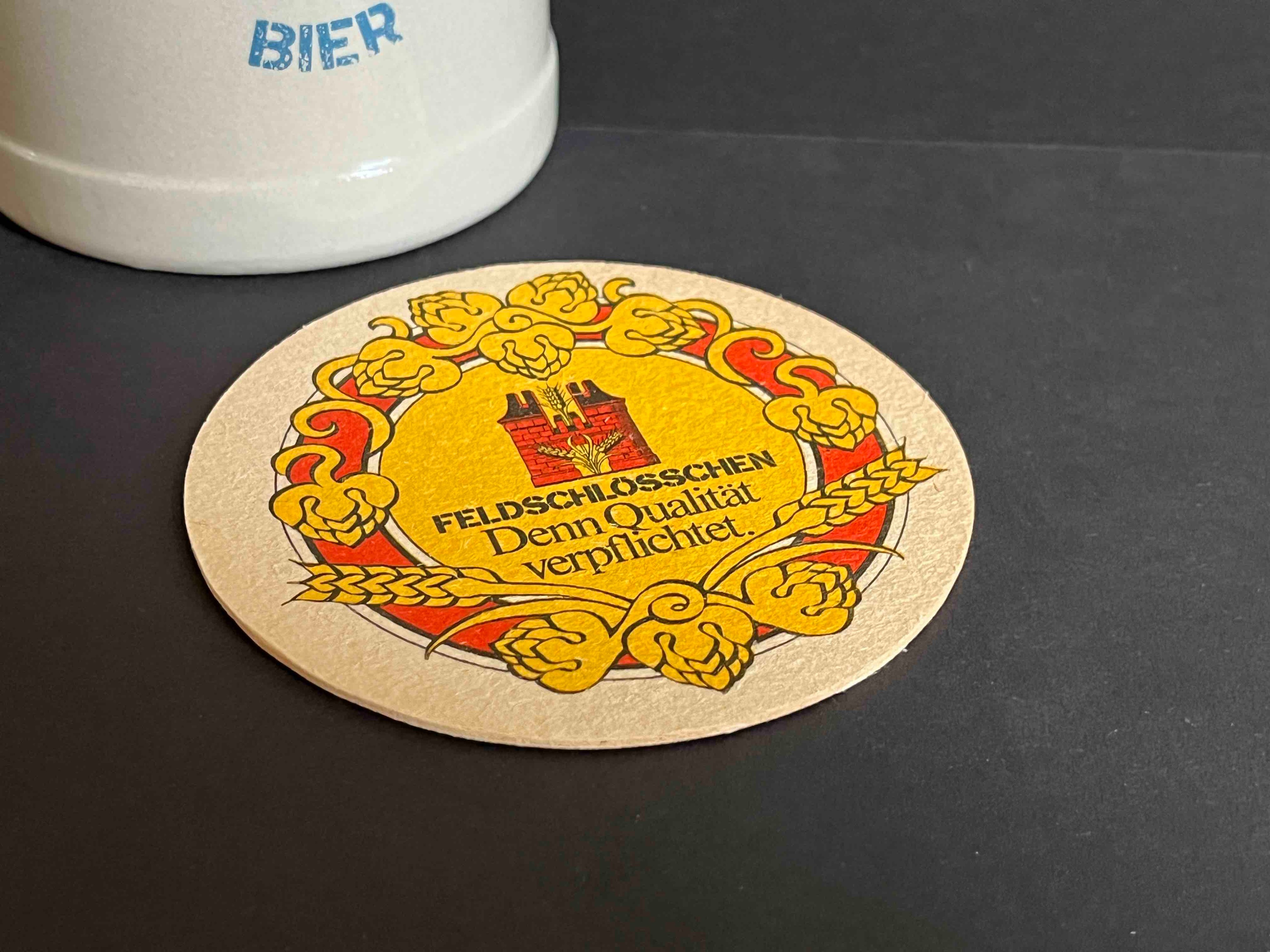 Bierkrug und Bierfilz "Feldschlösschen" Brauerei / Rheinfelden