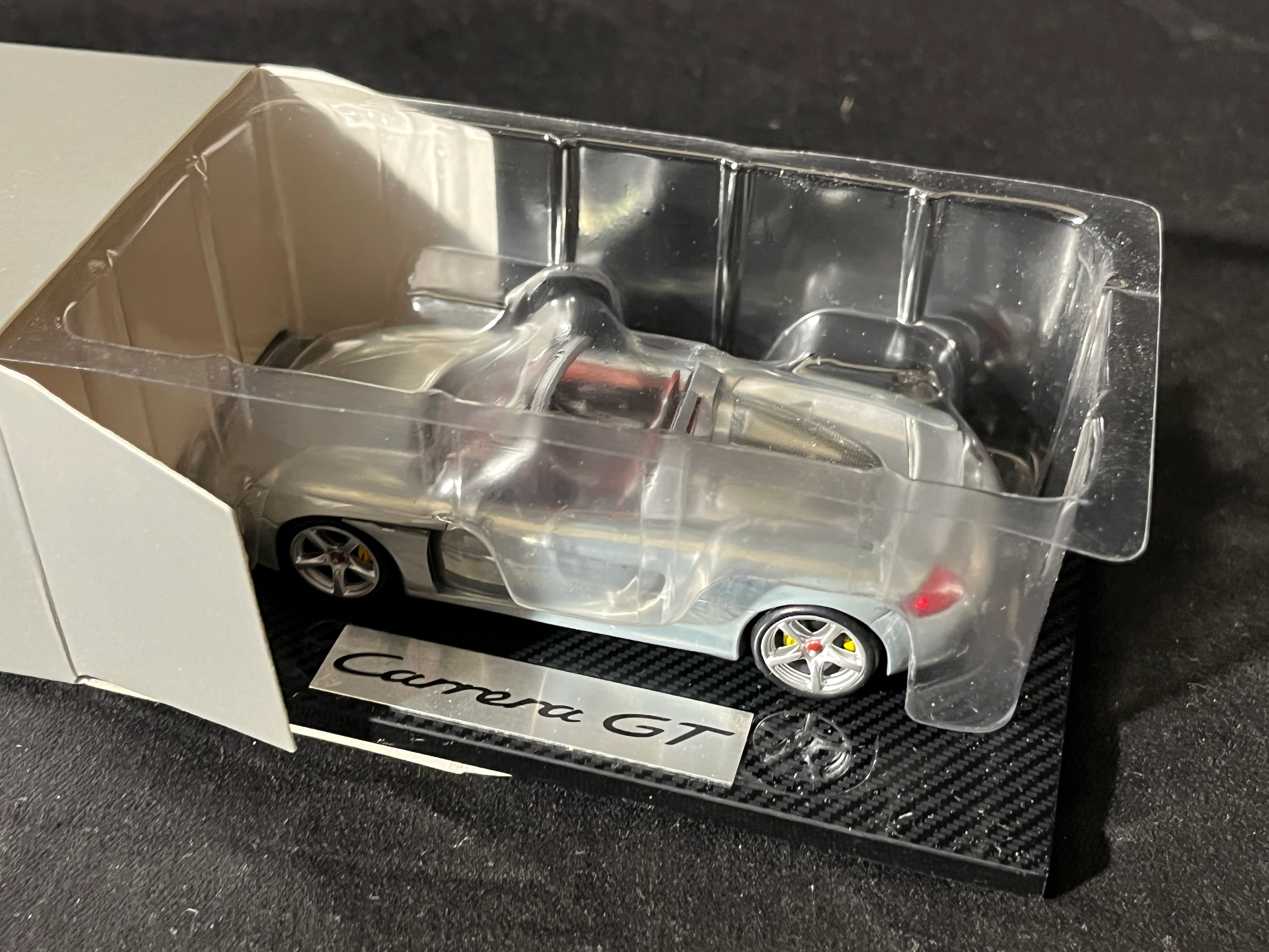 Porsche Carrera GT Werbemodell der PORSCHE AG 1:43 chrom in OVP