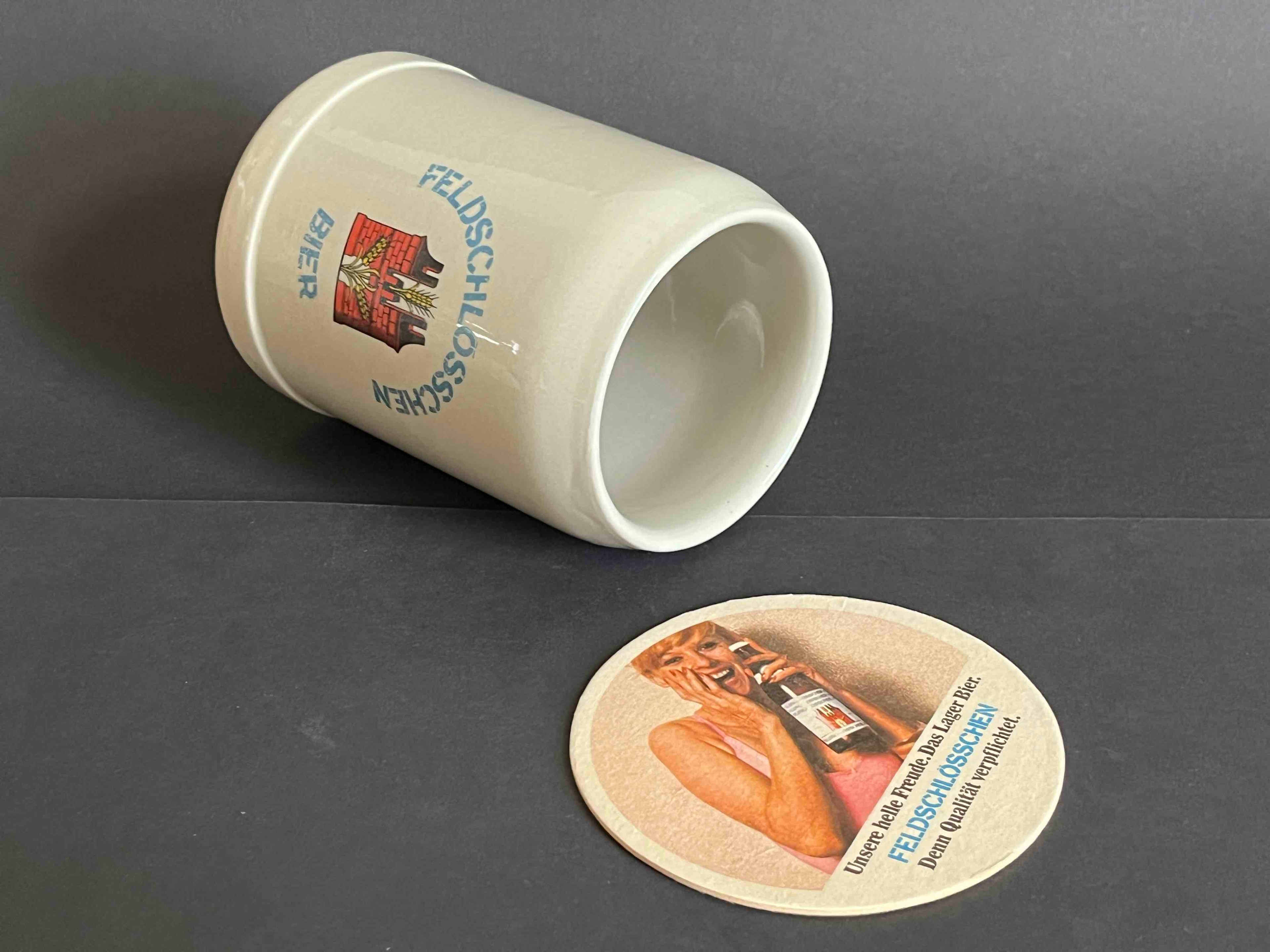 Bierkrug und Bierfilz "Feldschlösschen" Brauerei / Rheinfelden