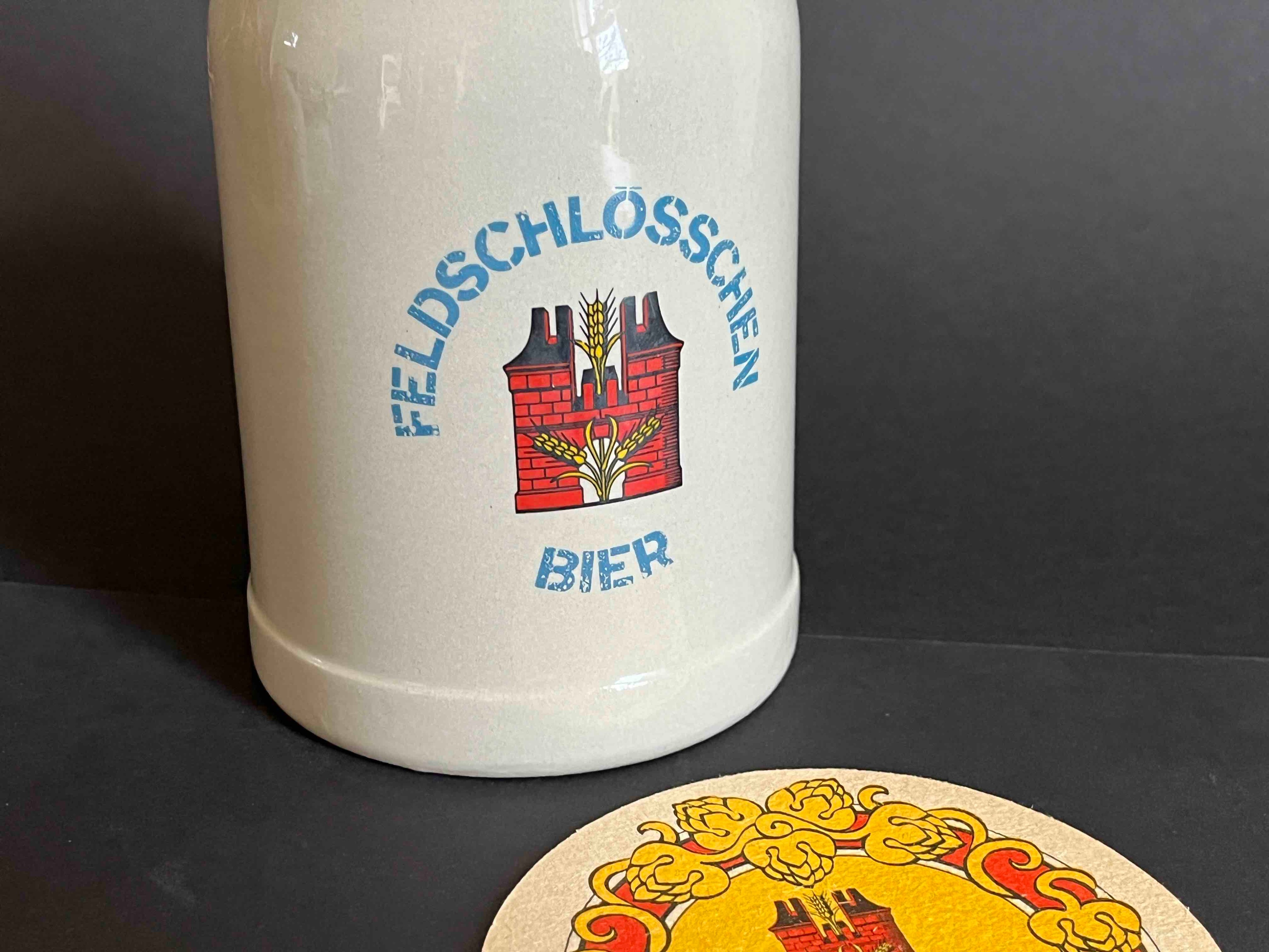 Bierkrug und Bierfilz "Feldschlösschen" Brauerei / Rheinfelden