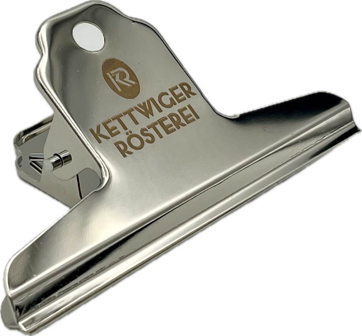 Verschluss-Klammer für Kaffeetüten mit dem Logo der Kettwiger Rösterei