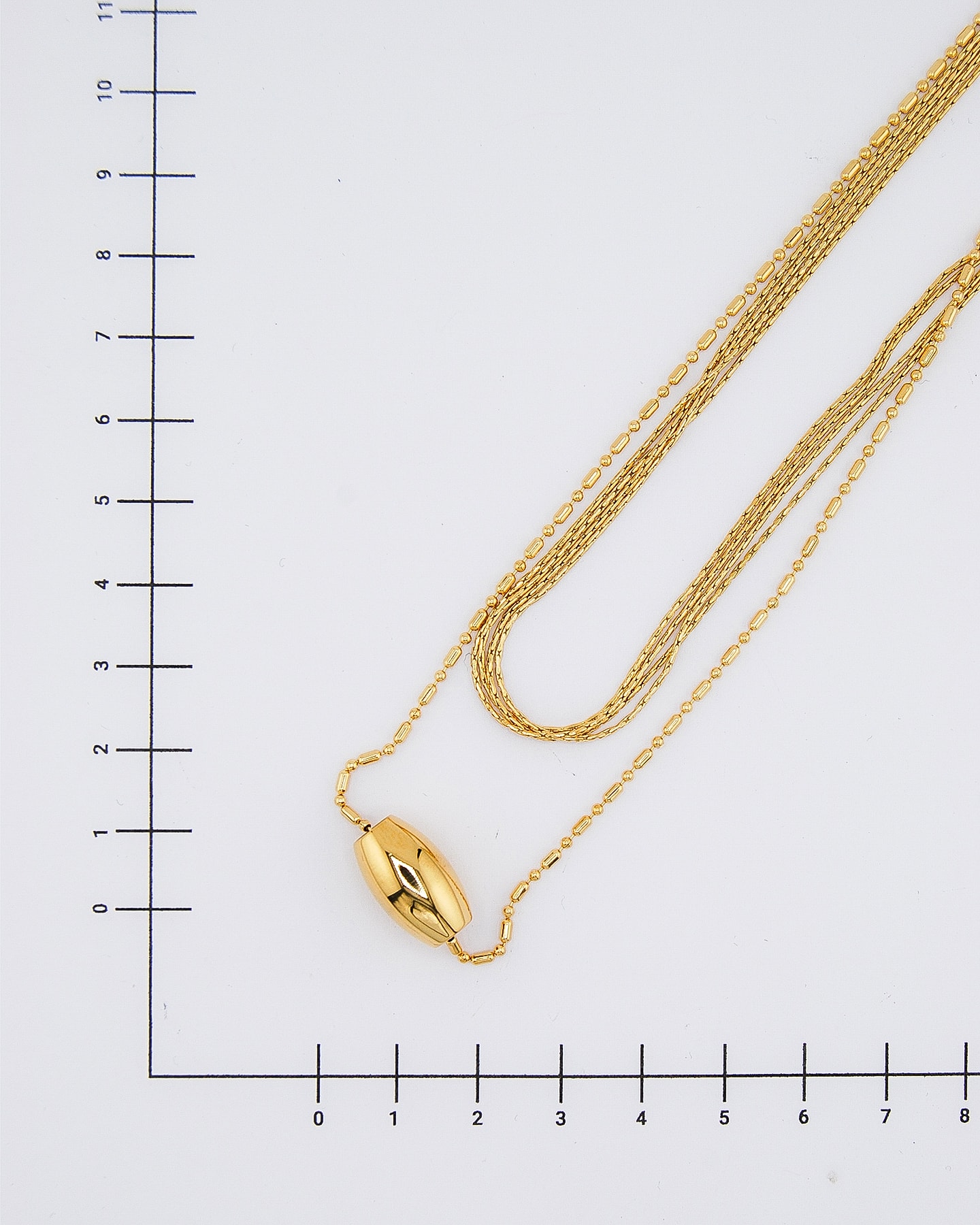 Mehrschichtige Halskette mit Gold-Zylinder Anhänger