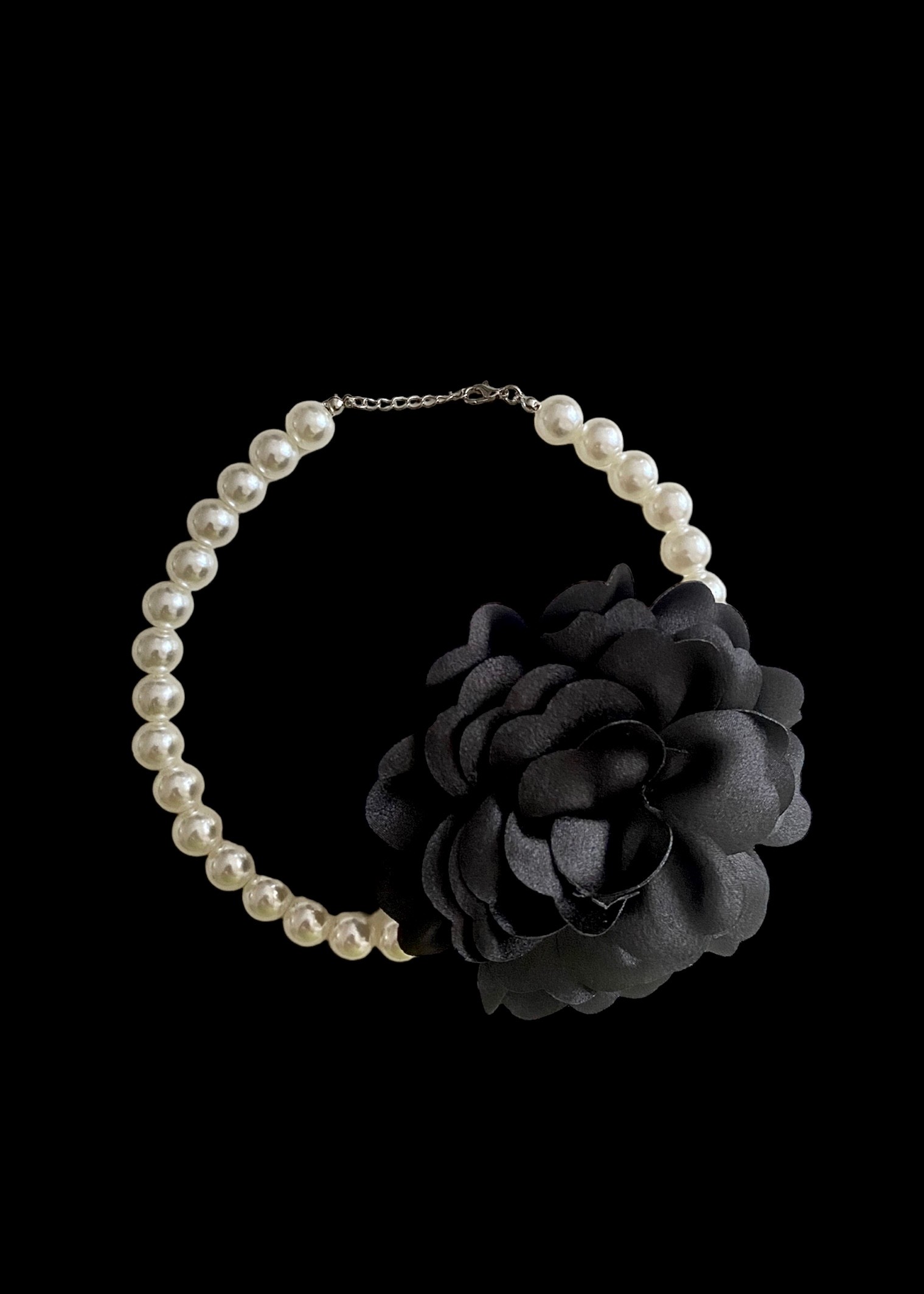 Pearl necklace with black satin flower