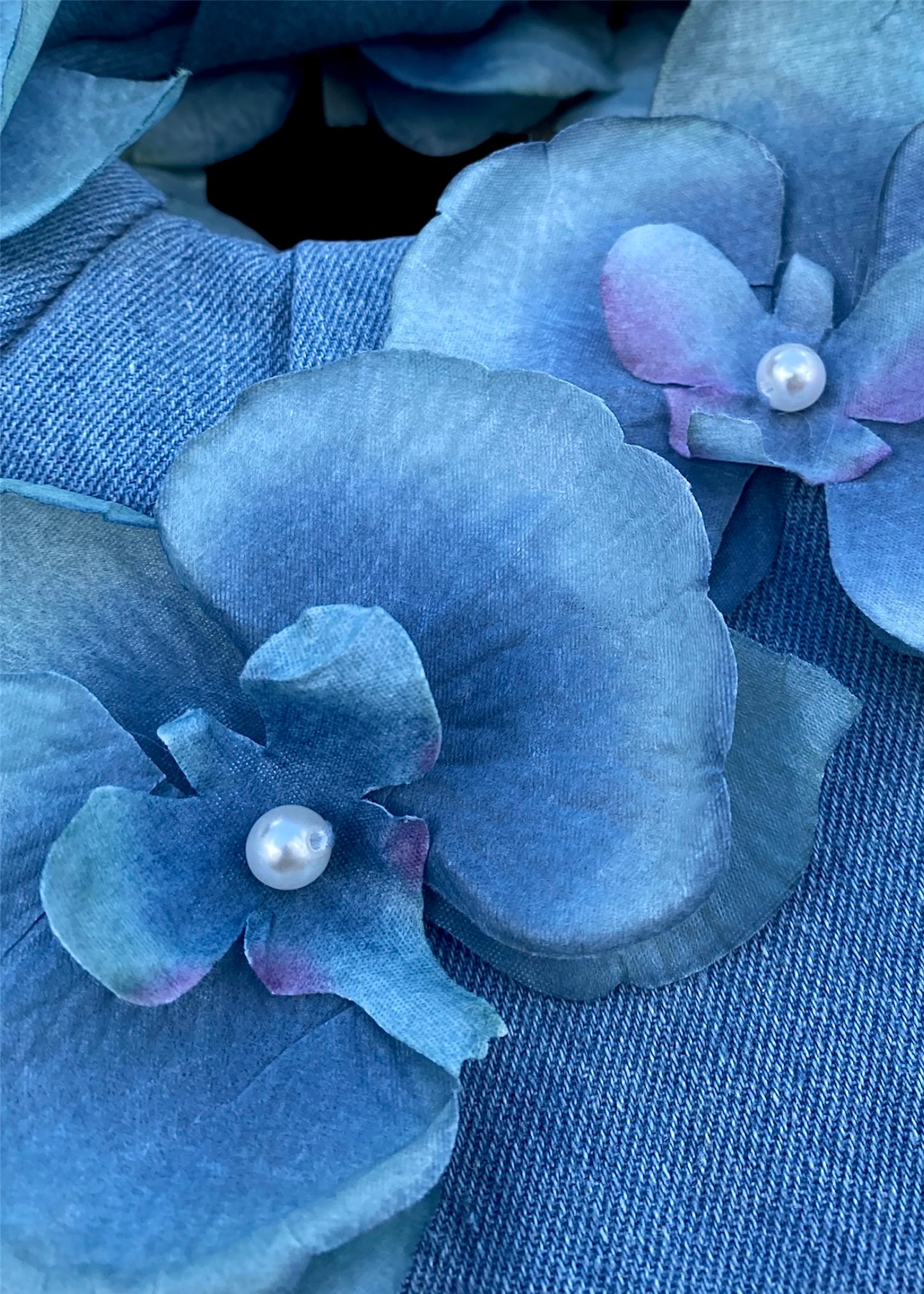 Denim handbag with monochrome orchid flowers and pearls 