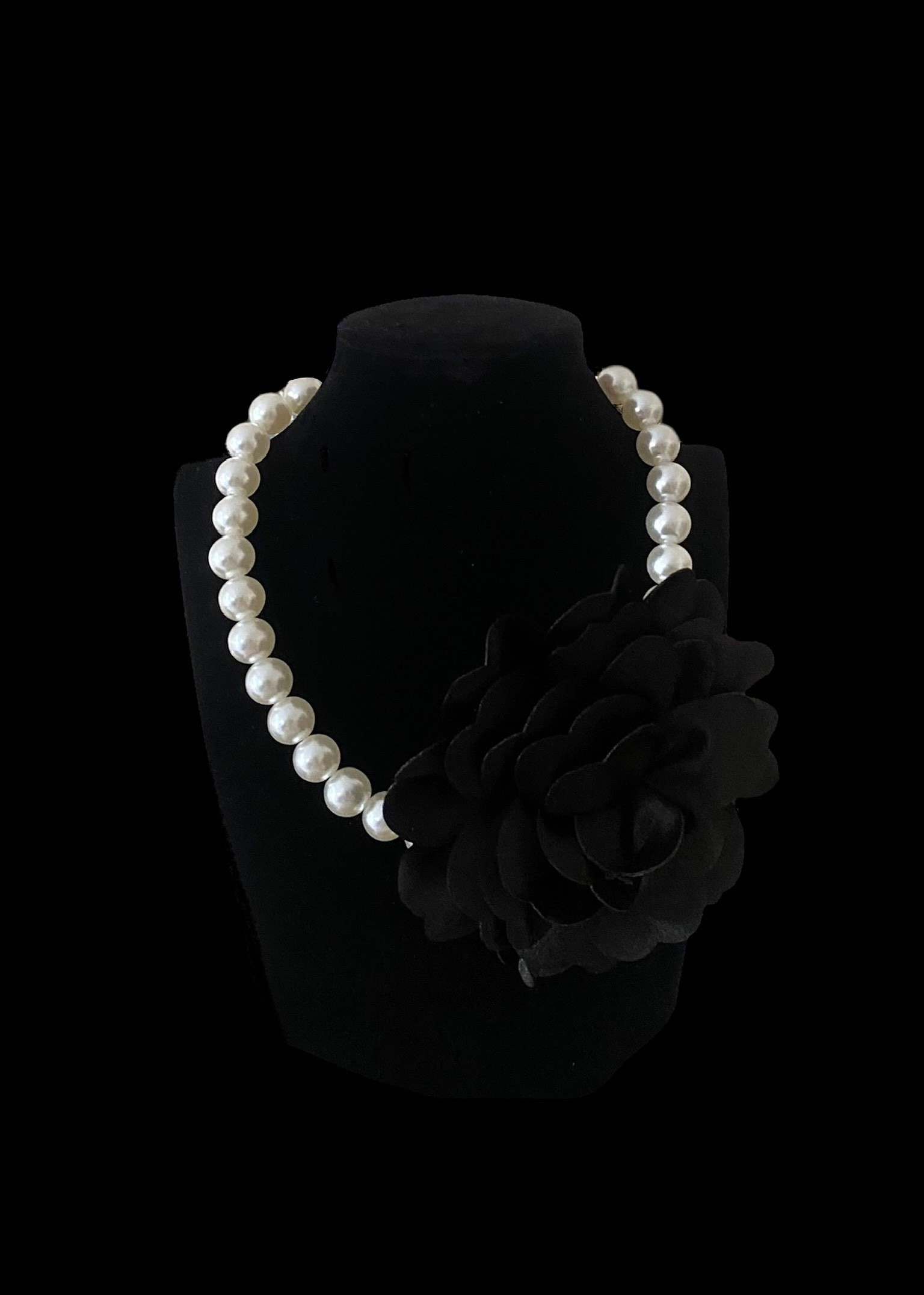 Pearl necklace with black satin flower